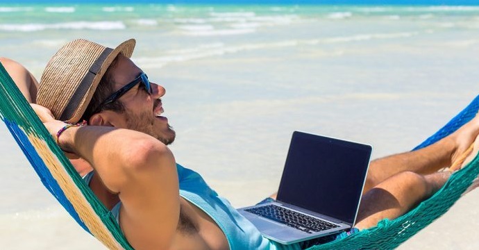 a man smiling in the sun